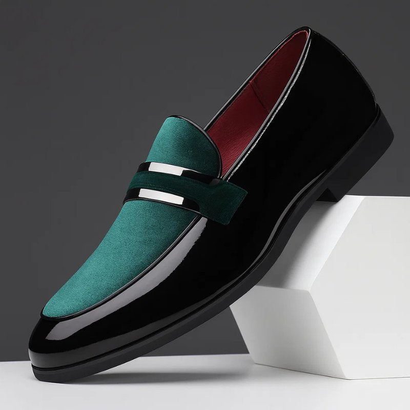 Formal men's Italian penny loafers, highly polished for a refined dress shoe look.
