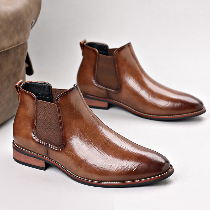 Light brown polished slip-on Chelsea boots for men, offering stylish comfort & sleek design.