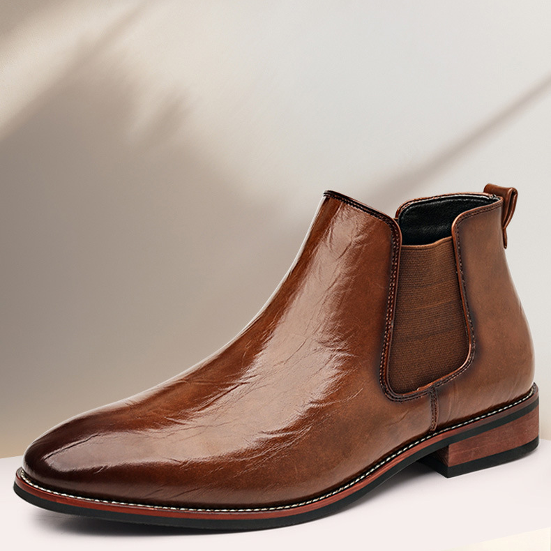 Black polished slip-on Chelsea boots, a comfortable and versatile men's dress shoe.