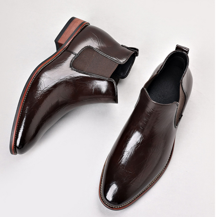 Polished men's dress shoes, slip-on Chelsea boots offering ultimate comfort and sleek style.