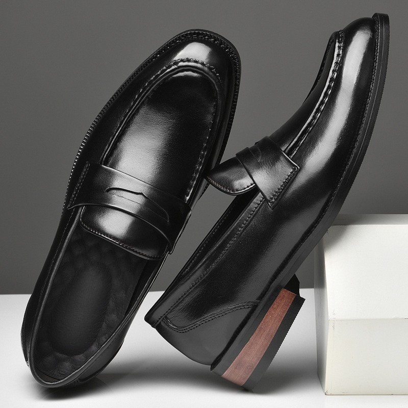 High-quality polished leather slip-on loafers for men, offering durable and stylish footwear.