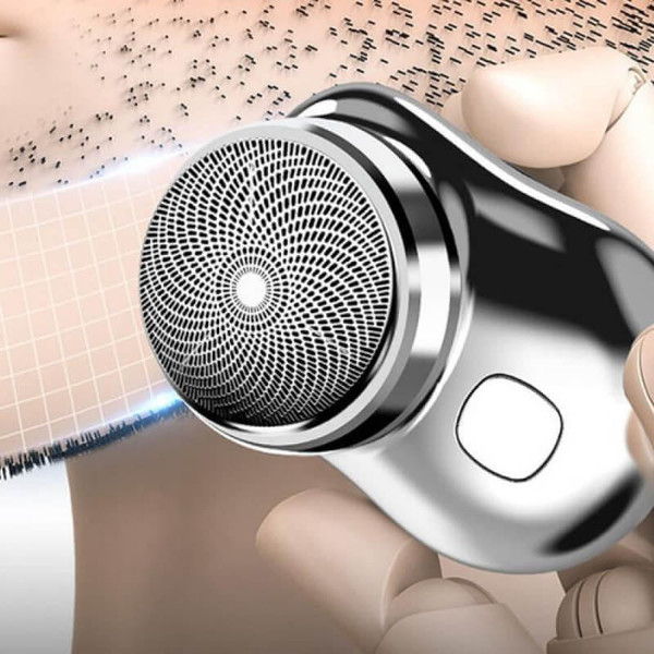 Modern men's electric shaver, USB rechargeable, mini, and portable for precision wet or dry grooming.
