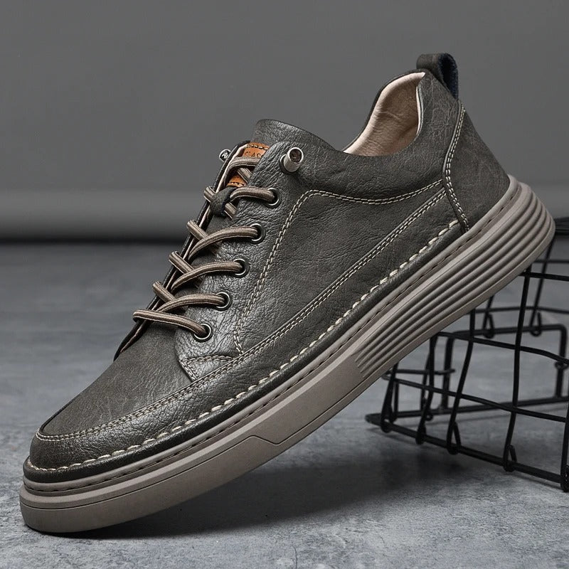 Gray Men's Leather Sneakers. Comfortable, durable gray genuine leather shoes for casual wear and classic style.