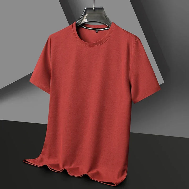 Stack of neatly folded men's premium textured t-shirts, ready for everyday casual wear & comfort.