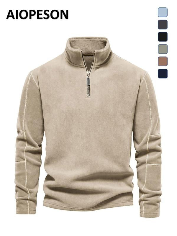 Warm men's quarter zip fleece pullover with a modern design, perfect for casual comfort.