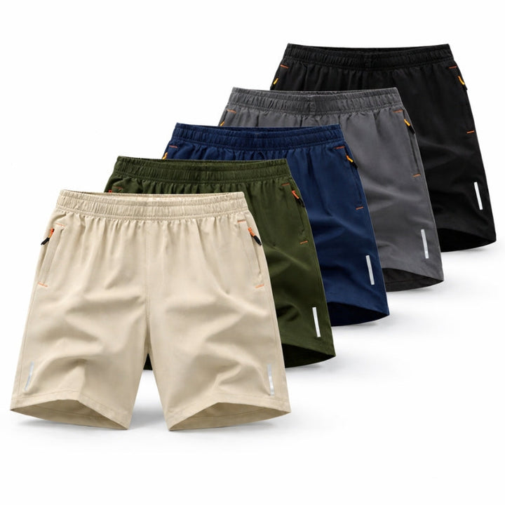 Activewear men's gym shorts with secure zippered pockets, designed for quick-dry performance & training.
