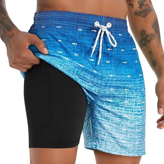 Folded men's quick-dry swim shorts, highlighting compact design & vibrant color for travel.