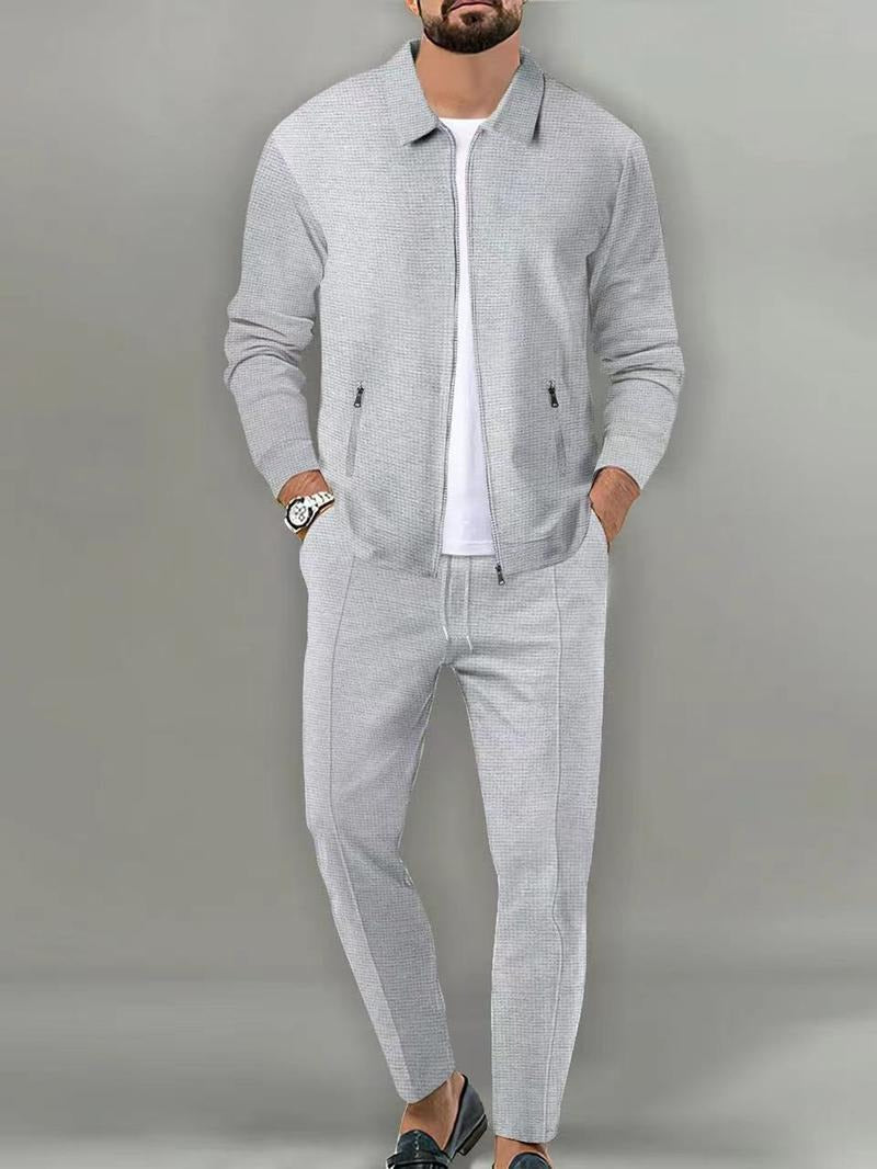 Stylish men's Ravenna zip tracksuit. Modern fit two-piece set, ideal for athletic activities & casual comfort.