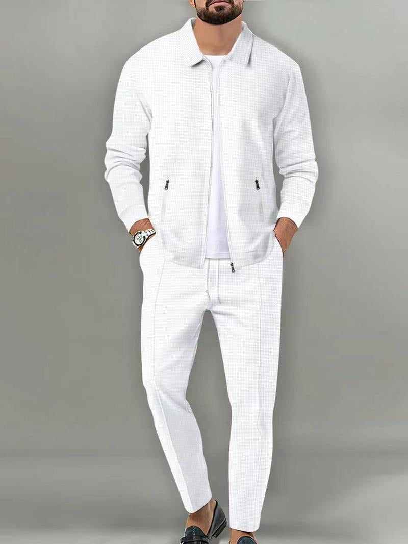 Men's Ravenna tracksuit set, offering elevated style & comfort. Zip jacket, joggers, and modern fit.