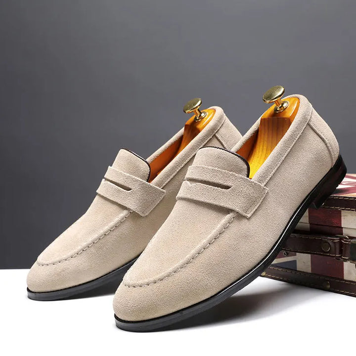 Comfortable men's Regal slip-on loafers, perfect for dress or casual outfits, featuring a classic yet versatile design.