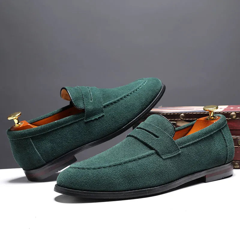 Stylish men's Regal slip-on loafers, crafted for sophistication and comfort, ideal as versatile dress or casual shoes.