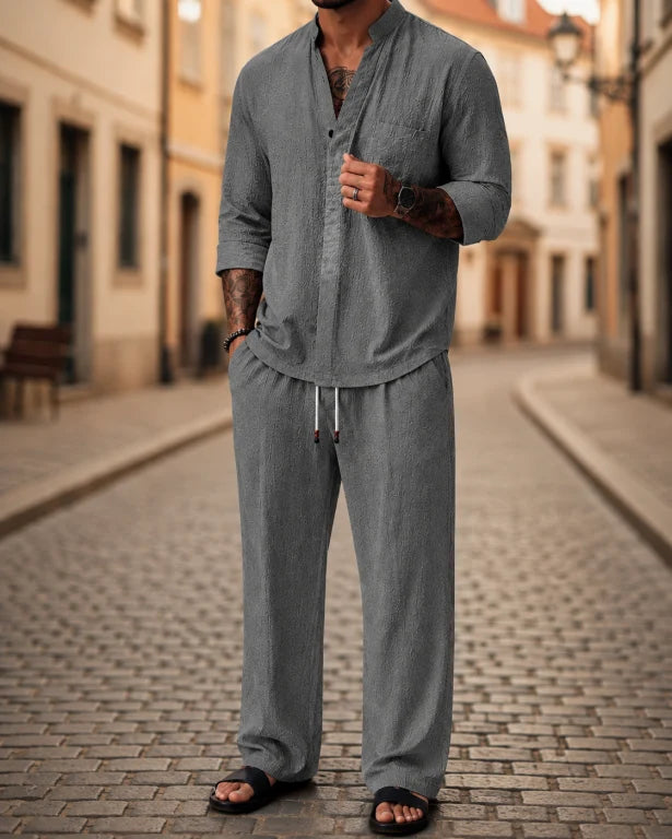 Stylish men's relaxed fit 2-piece shirt and pant set, perfect for casual summer outings and everyday comfort.