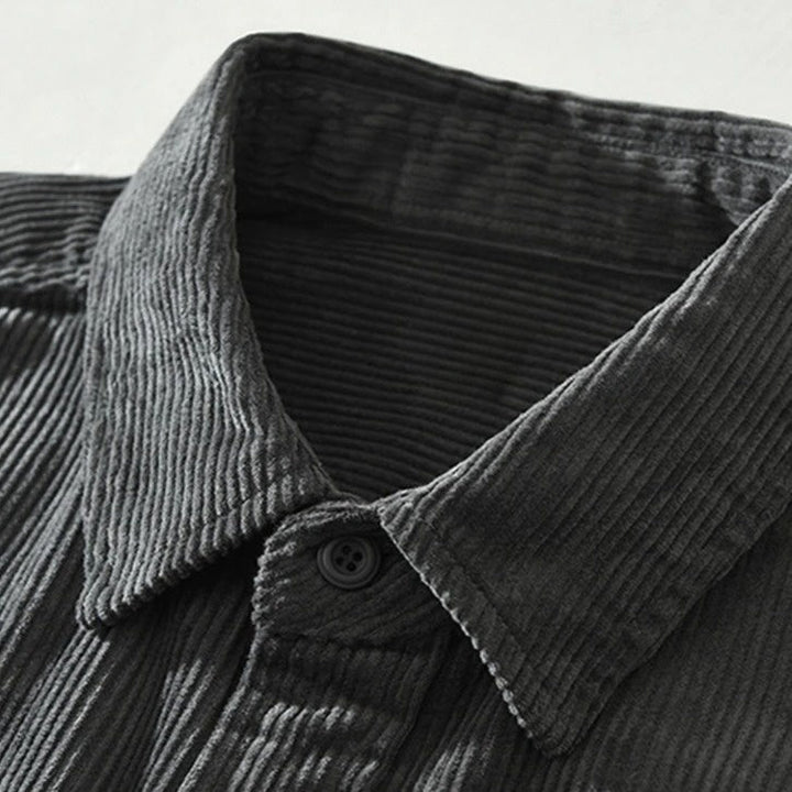 Stylish men's abstract pattern long-sleeve shirt in a relaxed fit. Versatile button-up casual menswear.