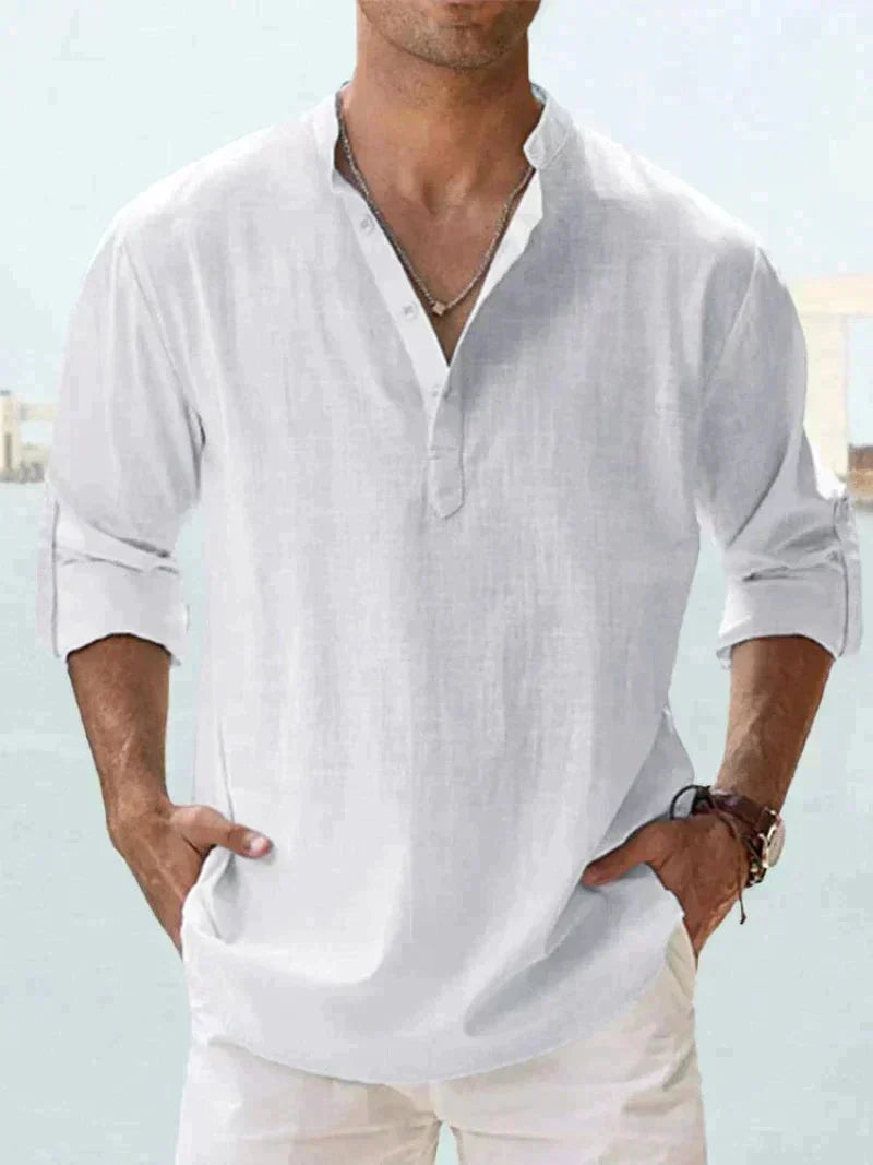 Relaxed fit men's summer shirt, button-down long sleeve style, suitable for various warm weather occasions.