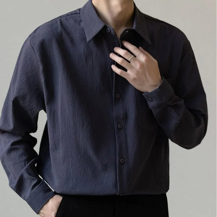 Stylish brown men's relaxed fit button-up shirt, perfect for casual everyday wear.