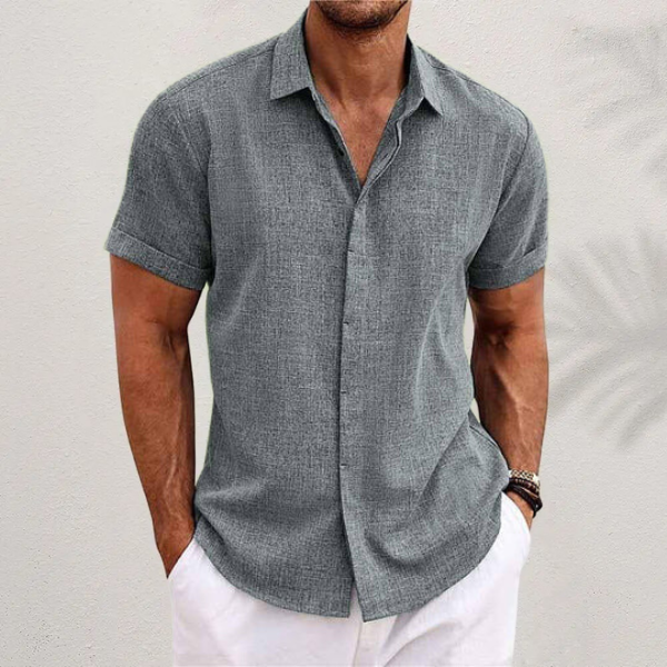 Stylish men's short-sleeve button-up shirt, ideal for versatile casual everyday spring & summer wear.