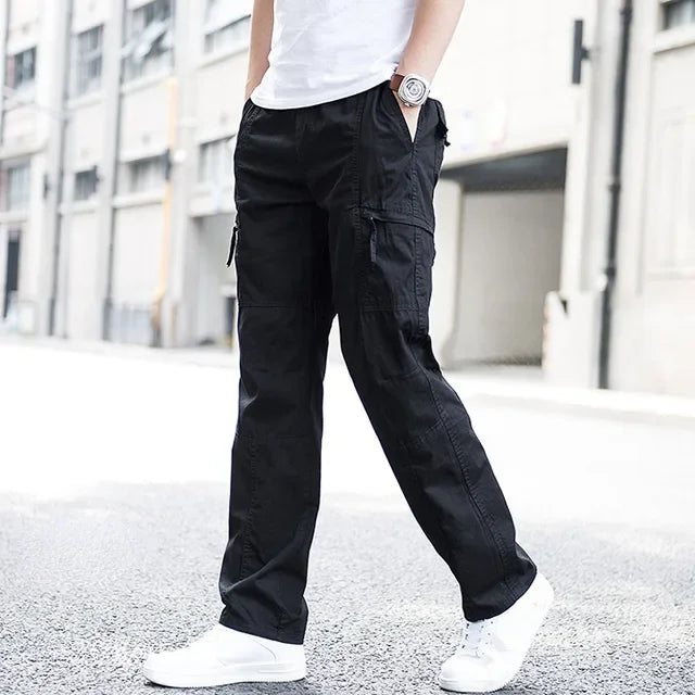 Gray men's comfortable relaxed fit cargo pants, designed with functional utility pockets for everyday wear.