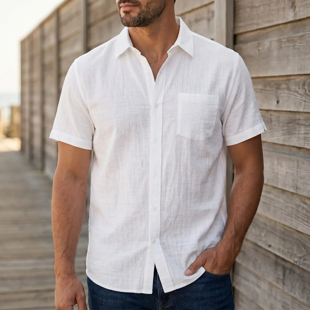 Men's relaxed fit casual short-sleeve button-down summer shirt, ideal for warm weather.