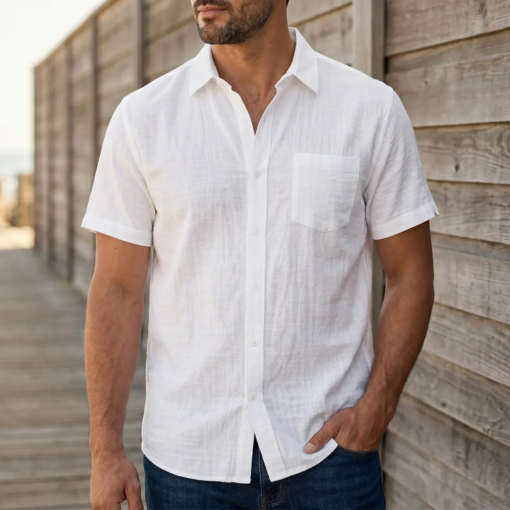 Men's relaxed fit casual short-sleeve button-down summer shirt, ideal for warm weather.