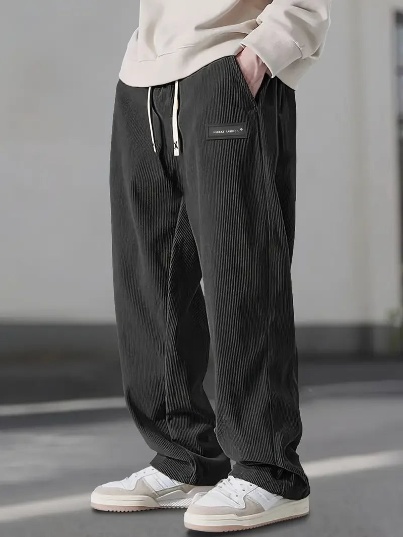 Streetwear-ready men's relaxed fit corduroy cargo pants. Comfortable & stylish multi-pocket trousers.