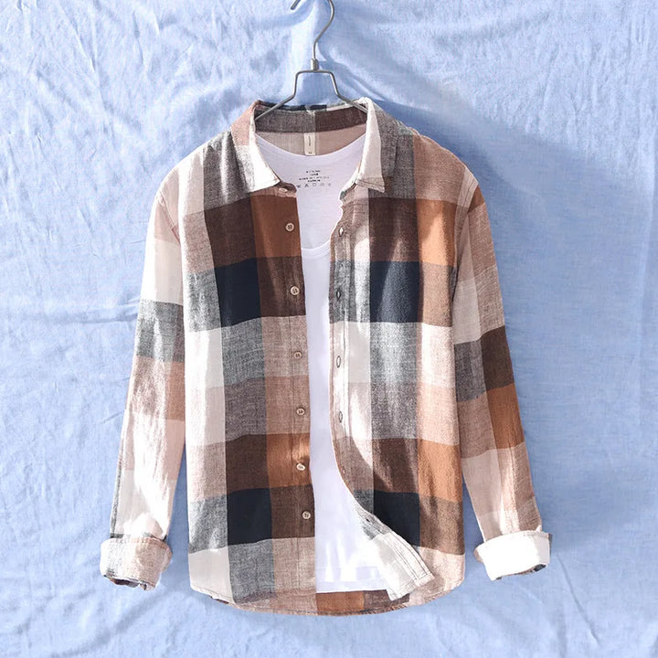 Casual men's long-sleeve cotton-linen button-up shirt with a relaxed fit, ideal for warm weather fashion.