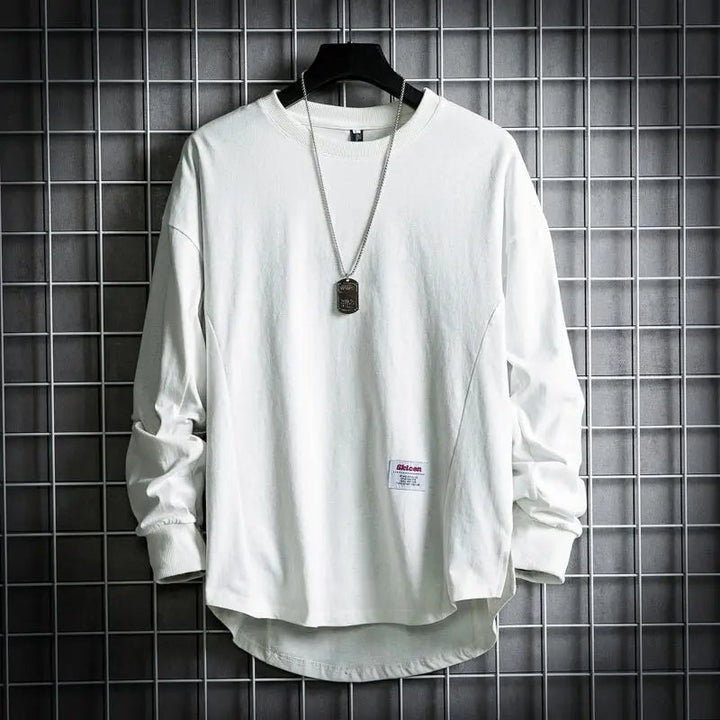 Relaxed fit men's drop hem pullover, perfect long sleeve crewneck for comfortable casual wear and layering.