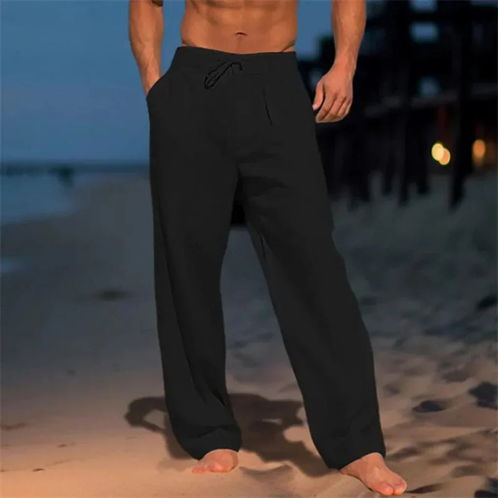 Man wearing men's relaxed fit drawstring dress pants for a comfortable yet smart casual office or weekend look.