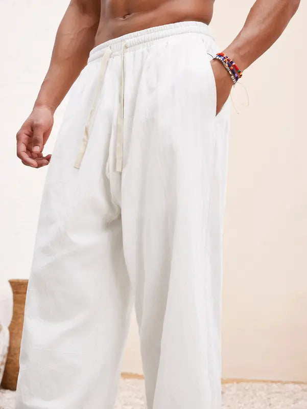 Soft men's linen blend lounge trousers, perfect for relaxed home wear or casual outings. Comfortable wide leg.