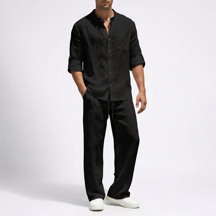 Comfortable men's linen two-piece set with relaxed fit shirt & drawstring pants for stylish summer fashion.