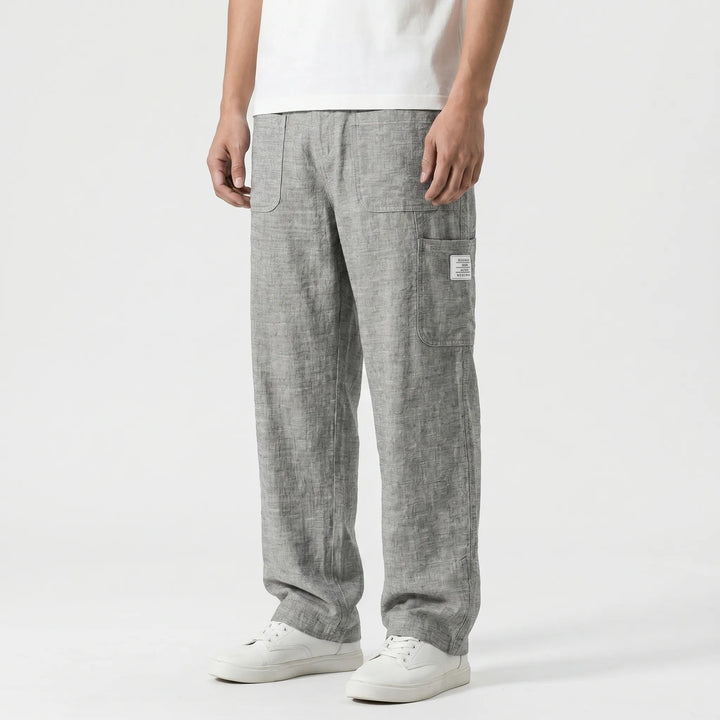Men's relaxed fit loose straight-leg casual pants. Comfortable design with drawstring waist for everyday fashion.