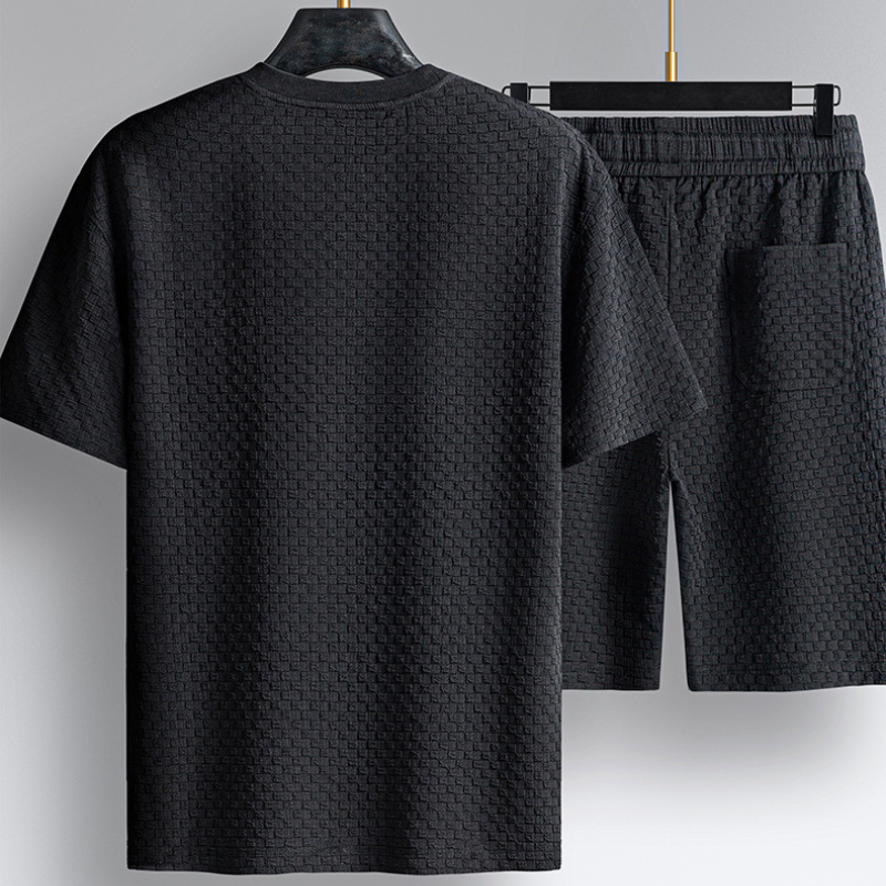 Matching men's two-piece loungewear set, relaxed fit design for ultimate comfort and casual everyday style.