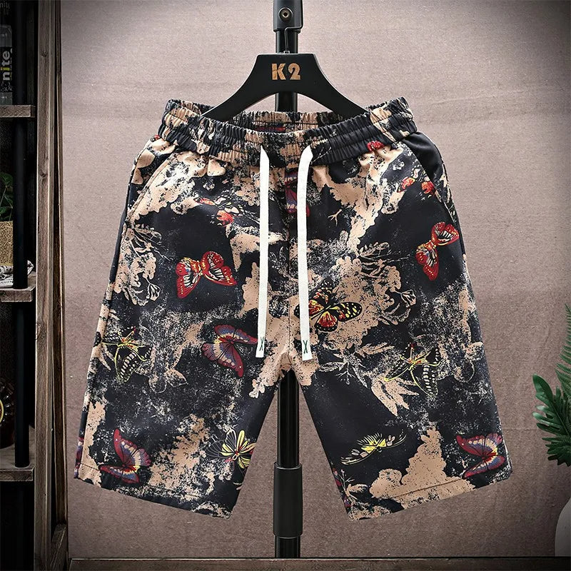 Men's relaxed fit patterned shorts with drawstring for casual summer comfort.