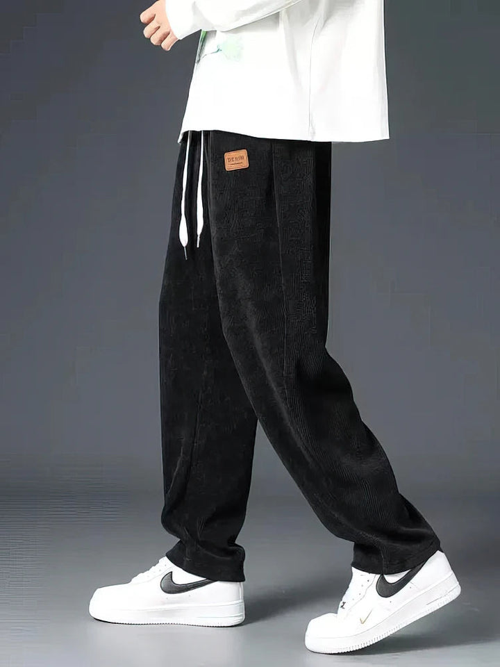 Men's relaxed fit straight-leg everyday pants with elastic waist & drawstring, perfect for comfortable casual wear.