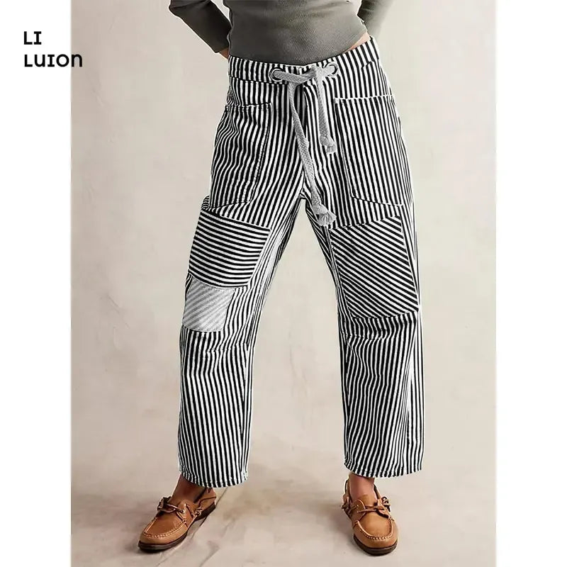 Unique men's striped patchwork pants, relaxed fit. Drawstring waist provides casual comfort & distinctive style.