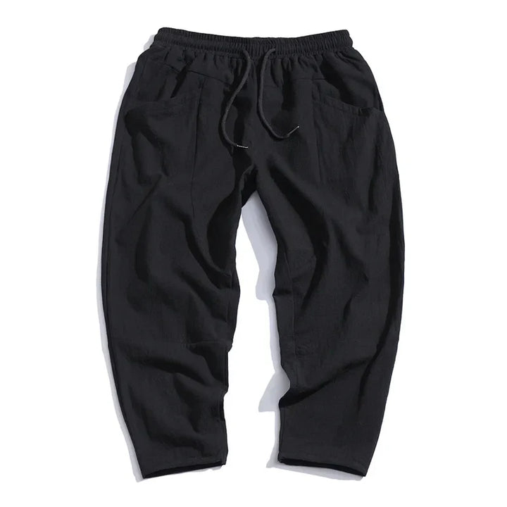 Everyday men's casual pants: relaxed tapered cropped design, lightweight & comfortable for any occasion.