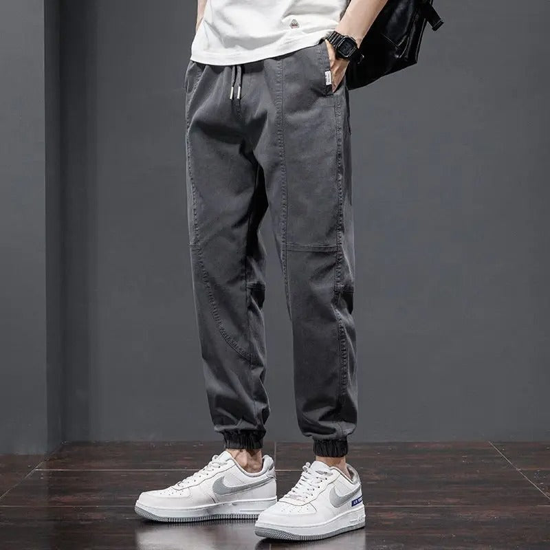 Versatile men's tapered joggers, cotton blend, relaxed fit for athletic workouts, casual outings & home comfort.