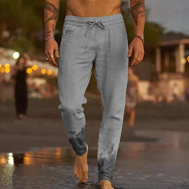 Comfortable men's tapered pants, relaxed fit for versatile everyday fashion and travel-ready beach style.