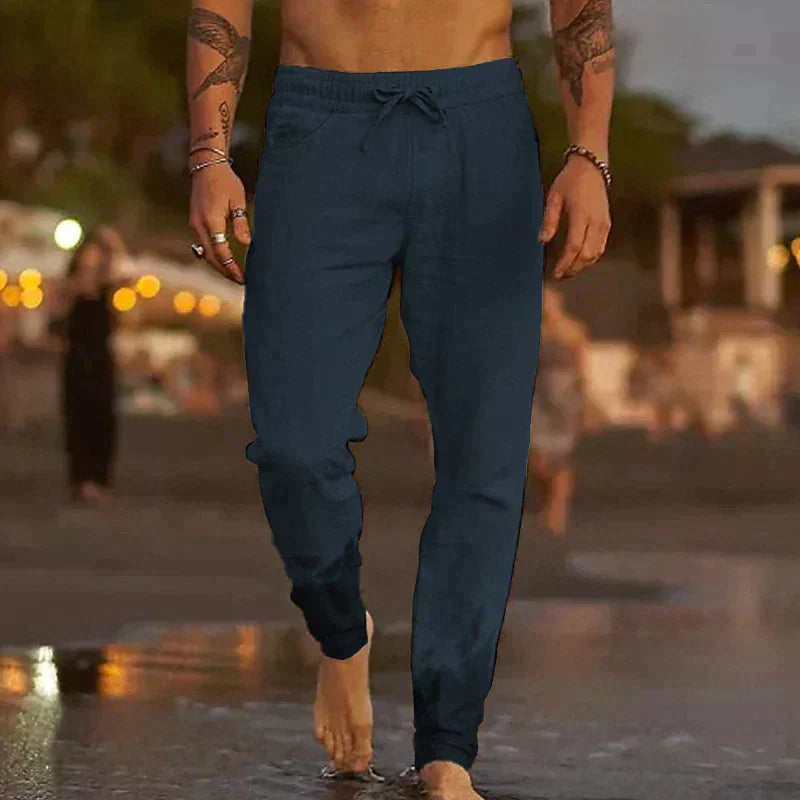 Lightweight & comfortable men's tapered pants, relaxed fit for all-day wear, ideal for summer travel.