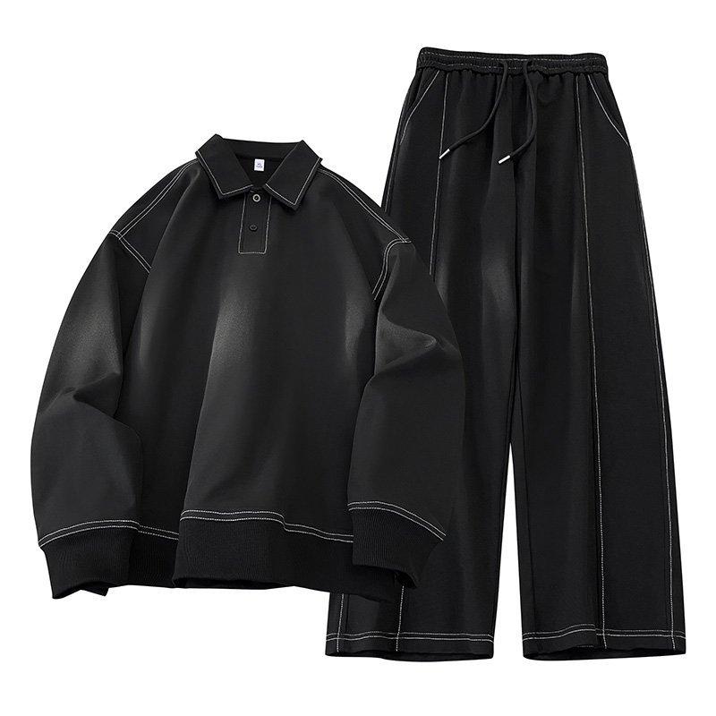 Stylish men's black cotton blend two-piece set with a relaxed fit pullover and comfy trousers. Ideal casual wear.