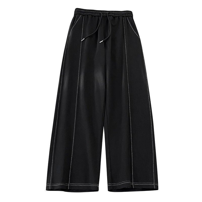 Stylish men's relaxed fit cotton blend two-piece set, with a comfortable pullover and casual trousers in black.