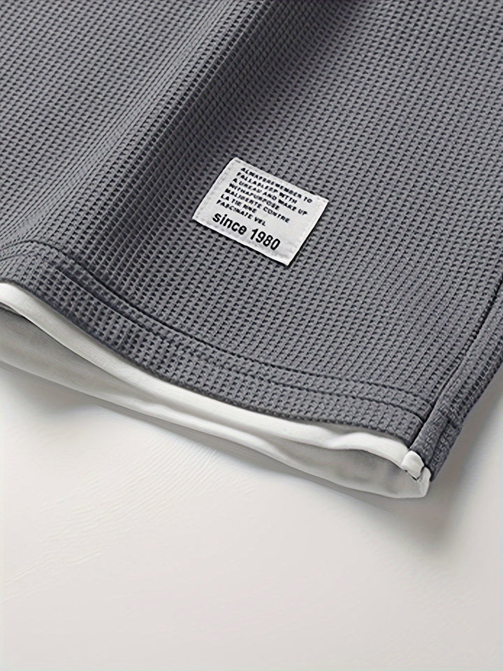 Stylish men's relaxed fit lounge set. Two-piece t-shirt & shorts for casual or home wear.