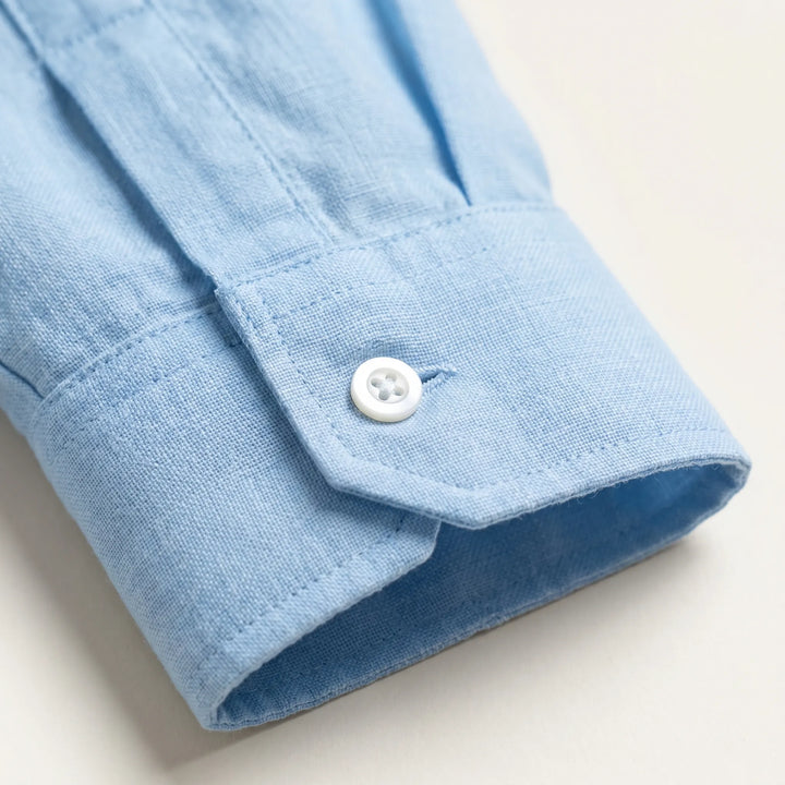 Versatile men's casual shirt, a solid color long-sleeve button-up with a comfortable relaxed fit.
