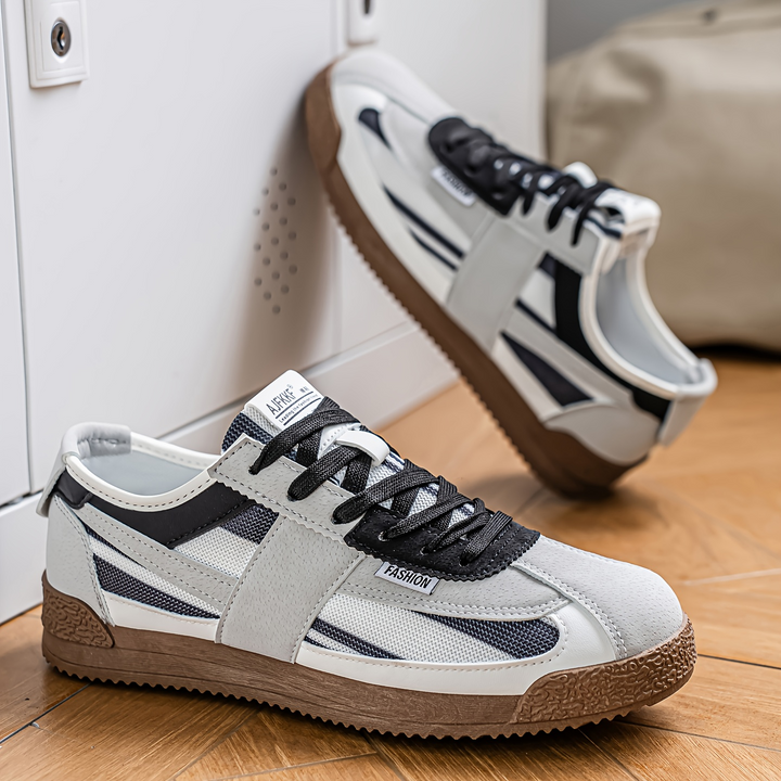 Retro men's athletic footwear, vibrant & comfortable, a staple for any streetwear collection.