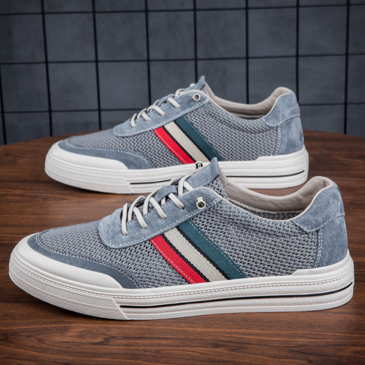 Top view of denim blue men's retro sneakers, comfortable lace-up design for athleisure & casual.