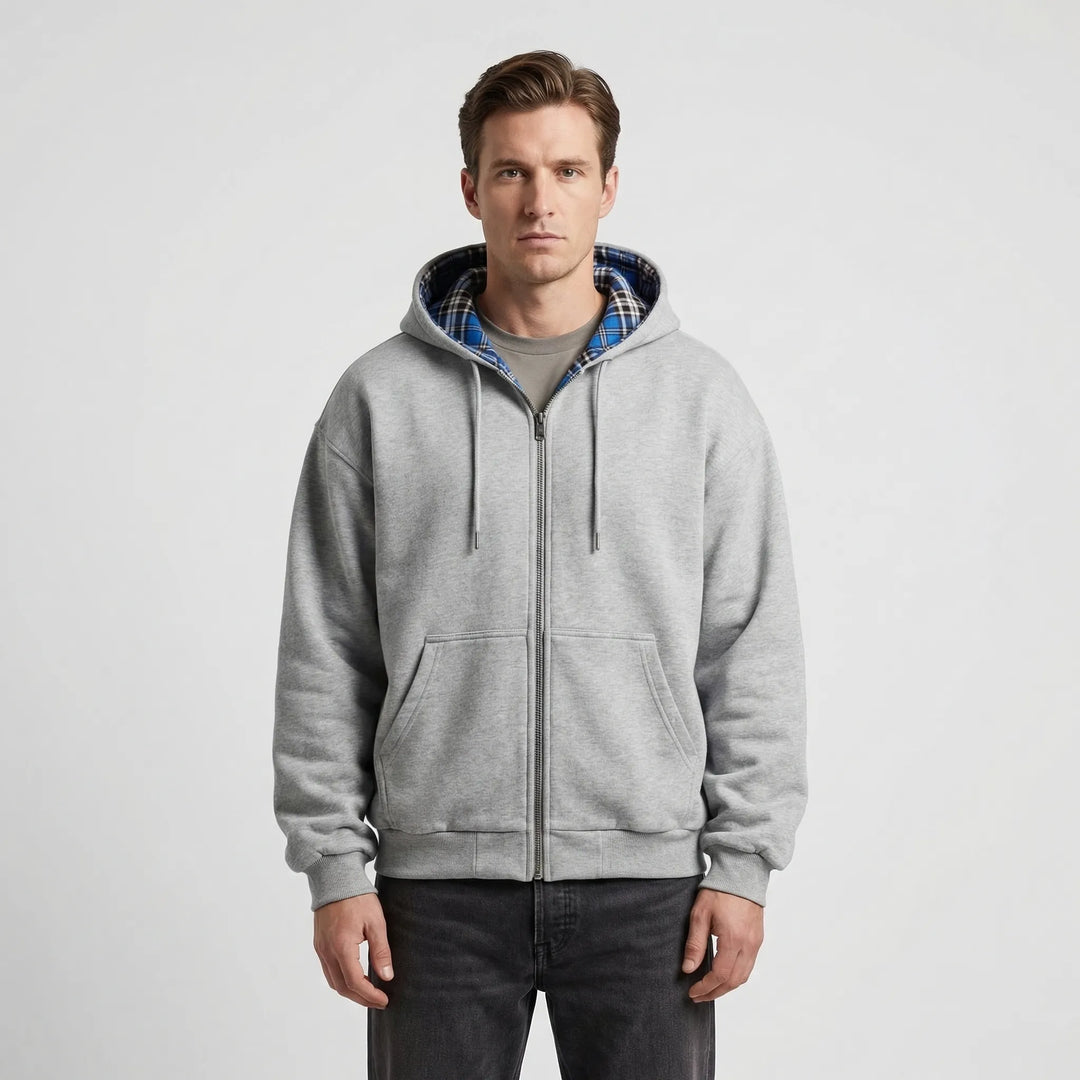 Man wearing a stylish Josh reversible oversized hoodie, demonstrating its relaxed streetwear fit and modern fashion.