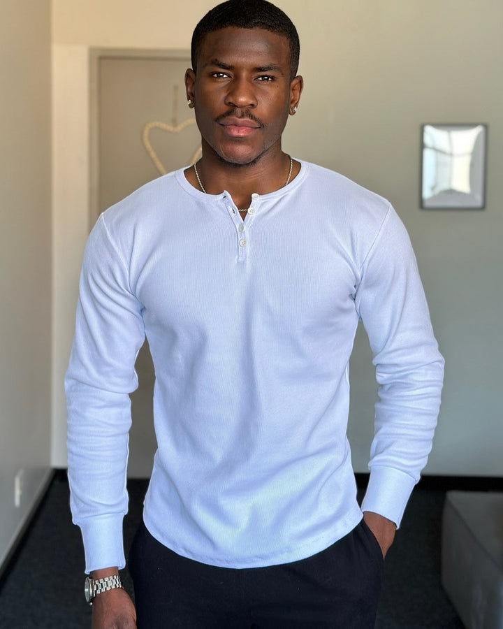 Stylish men's long sleeve ribbed henley, perfect for fall layering or standalone casual outfits.