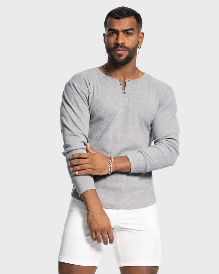 Fall fashion men's rib knit henley, long sleeve top offering everyday comfort and style.