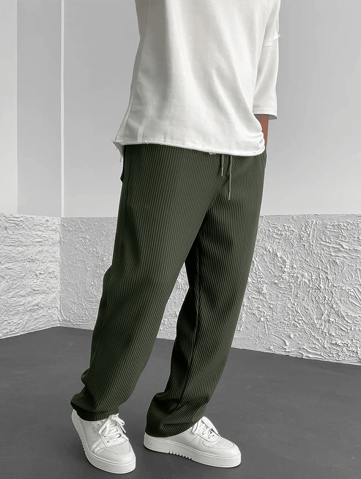 Comfortable men's ribbed jogger pants, ideal for casual wear & lounging. Modern bottom.