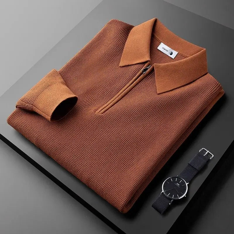 Stylish men's ribbed 1/4 zip polo sweater with long sleeves, a key piece for fall/winter wear.