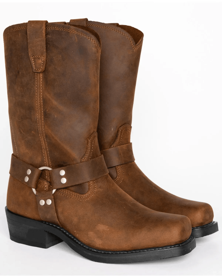 Close-up of men's robust harness boots, showcasing sturdy leather and an oil-resistant, traction-grip sole.